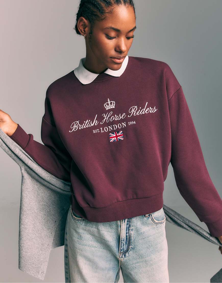 Stradivarius - Besticktes Sweatshirt in Lila mit Polokragen von Stradivarius