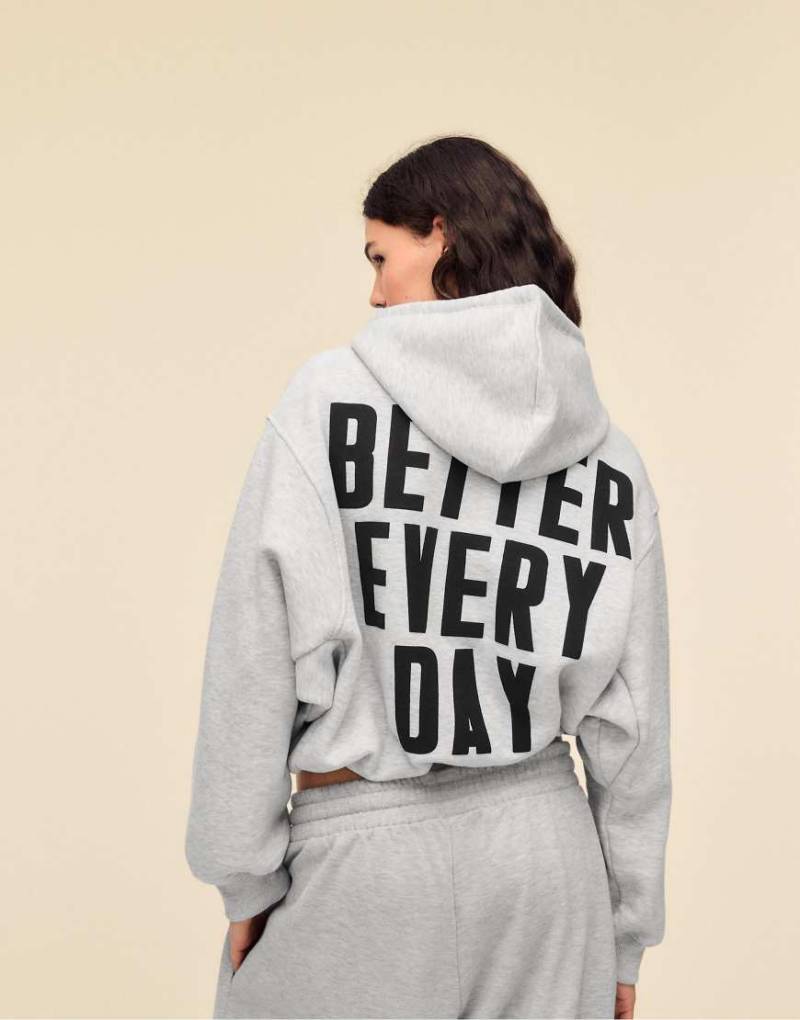 Stradivarius - Bomber-Sweatshirt in Grau meliert mit Kapuze und Print von Stradivarius