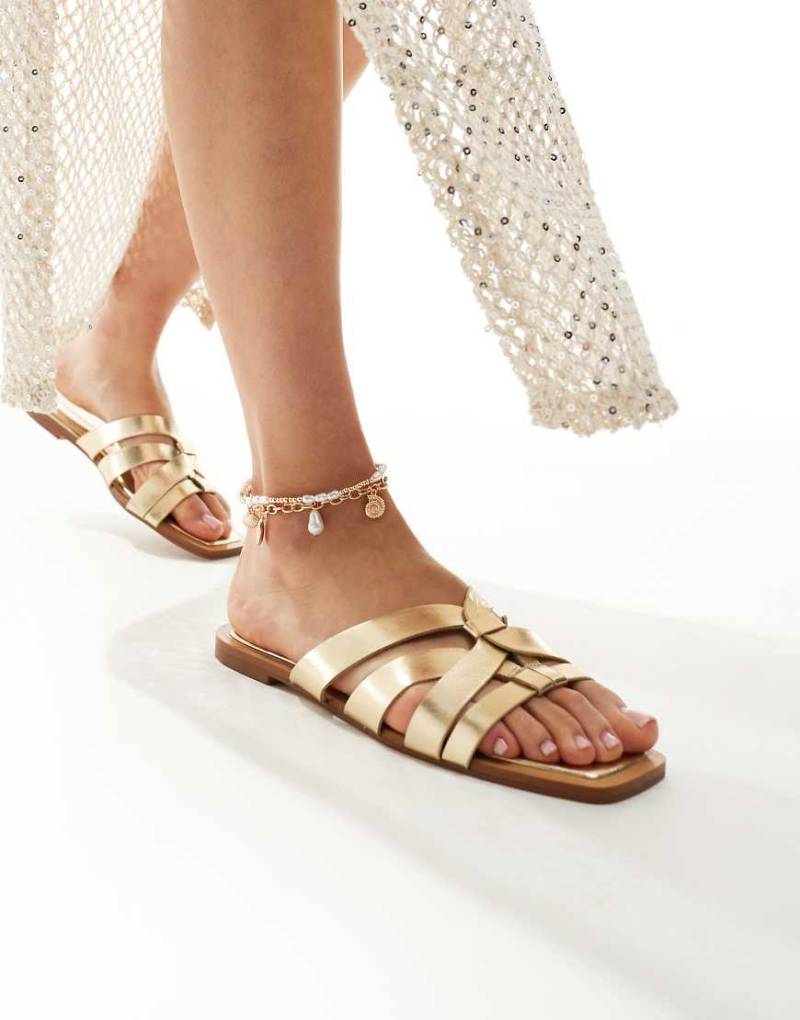 Stradivarius - Flache Slider in Gold mit Riemchen-Goldfarben von Stradivarius