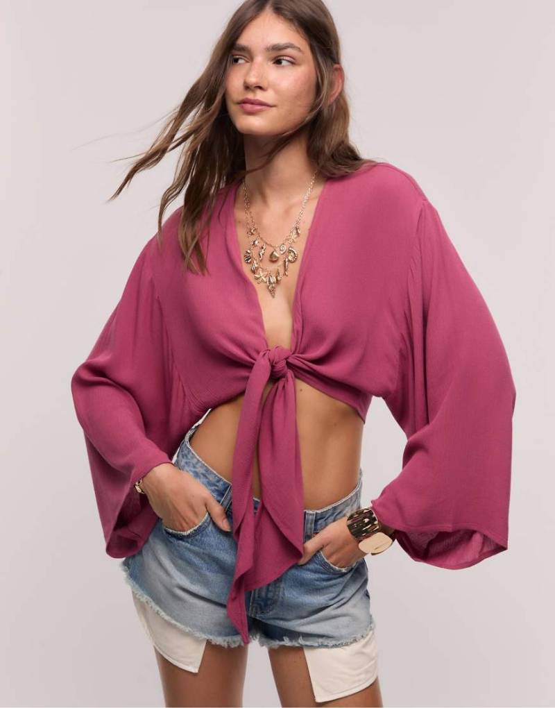 Stradivarius - Fließende Bluse in Hellrosa mit Knotendetail von Stradivarius