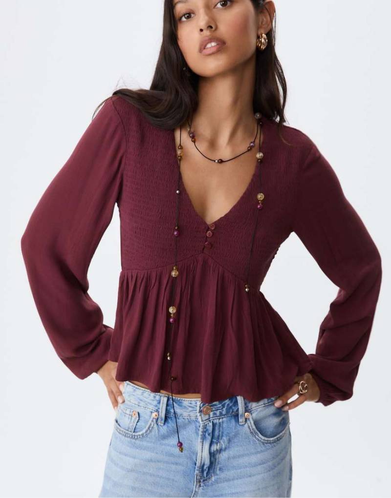 Stradivarius - Langärmlige Bluse in Lila mit lockerem Schnitt von Stradivarius