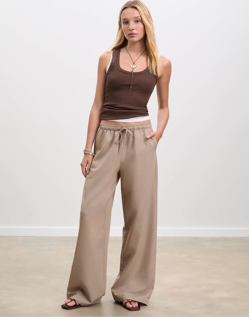 Stradivarius - Lange, elegante Hose aus weich fallendem Stoff in Creme-Weiß von Stradivarius