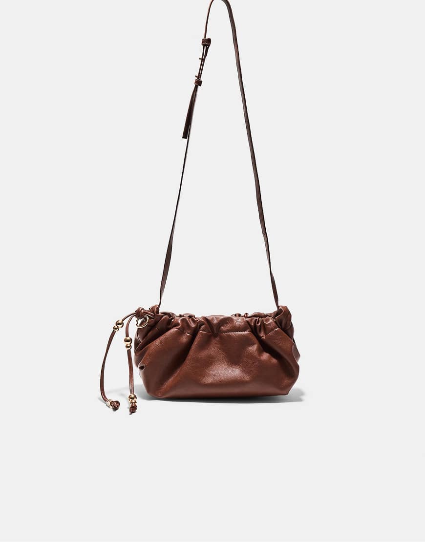 Stradivarius - Mit Perlen verzierte Umhängetasche in Braun-Brown Stradivarius - Mit Perlen verzierte Umhängetasche in Braun-Brown von Stradivarius