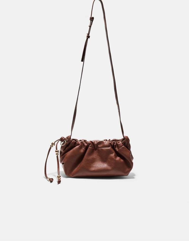 Stradivarius - Mit Perlen verzierte Umhängetasche in Braun-Brown Stradivarius - Mit Perlen verzierte Umhängetasche in Braun-Brown von Stradivarius