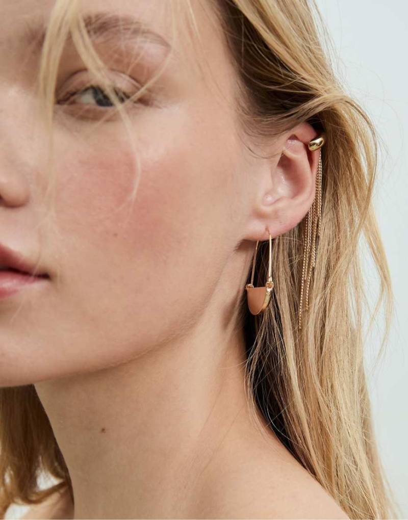 Stradivarius - Set aus goldfarbenen Creolen und Ohrklammer-Gelb Stradivarius - Set aus goldfarbenen Creolen und Ohrklammer-Gelb von Stradivarius