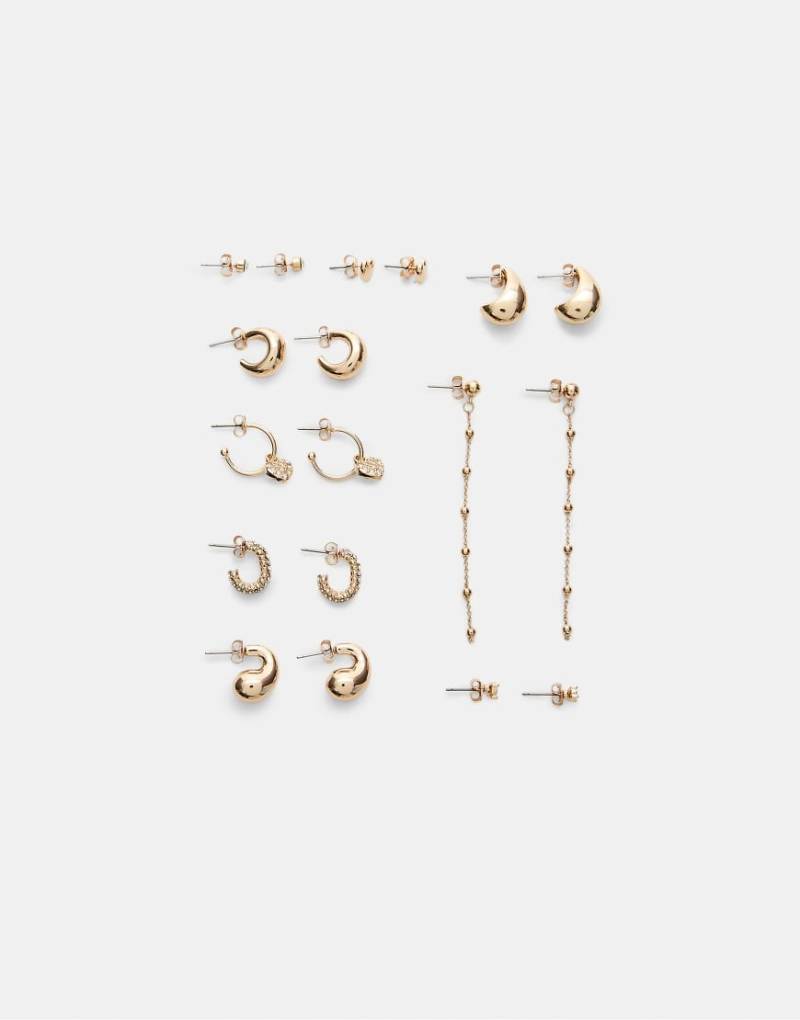 Stradivarius - Set mit 9 Paar Ohrsteckern und Creolen in Gold-Optik mit Herz-Design-Gelb von Stradivarius