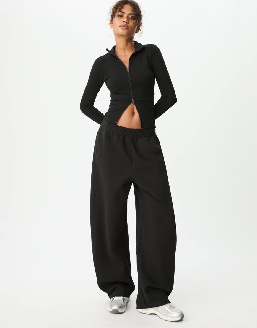 Stradivarius - T-Shirt in Schwarz mit Zwei-Wege-Reißverschluss von Stradivarius