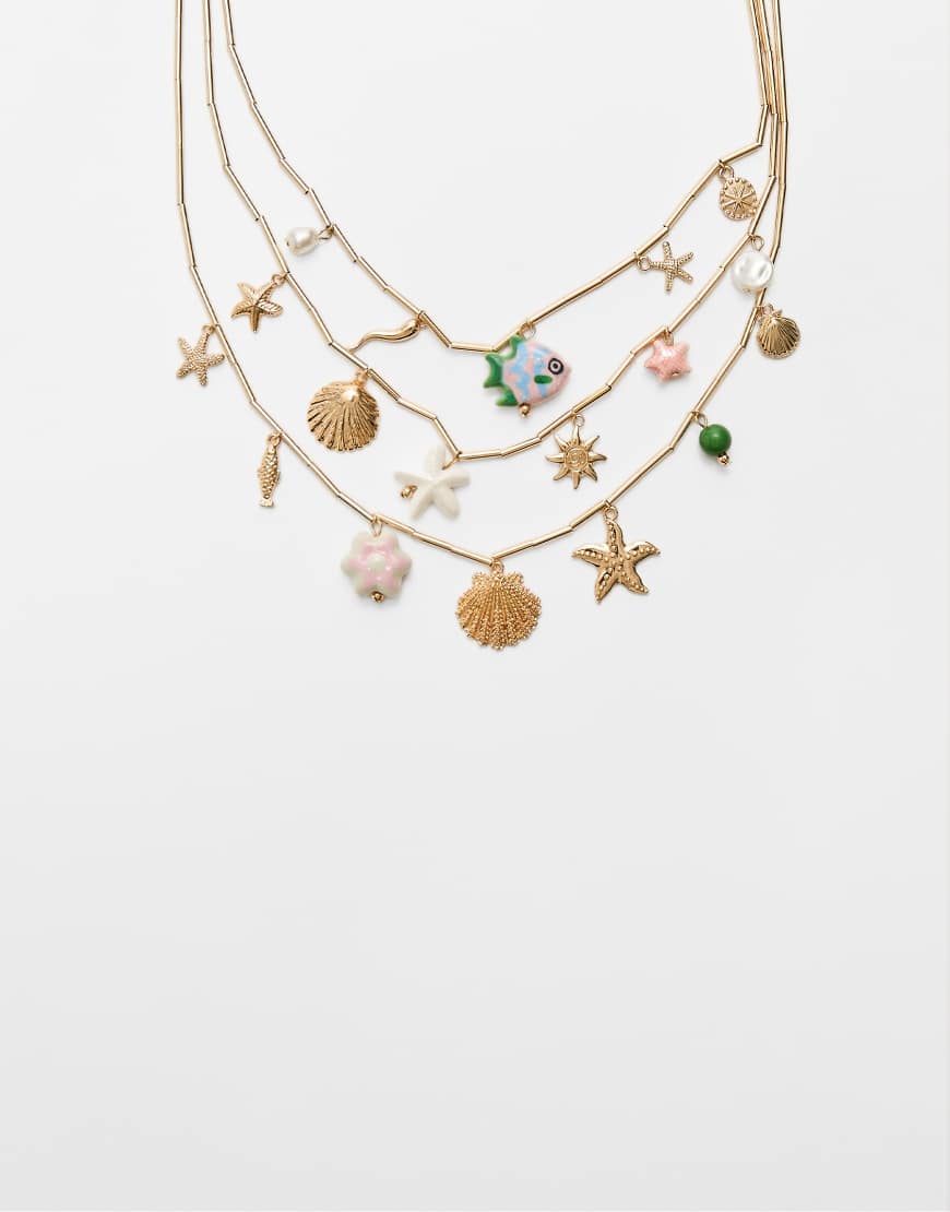 Stradivarius - Under The Sea - Halskette in Gold mit Anhängern-Gelb von Stradivarius