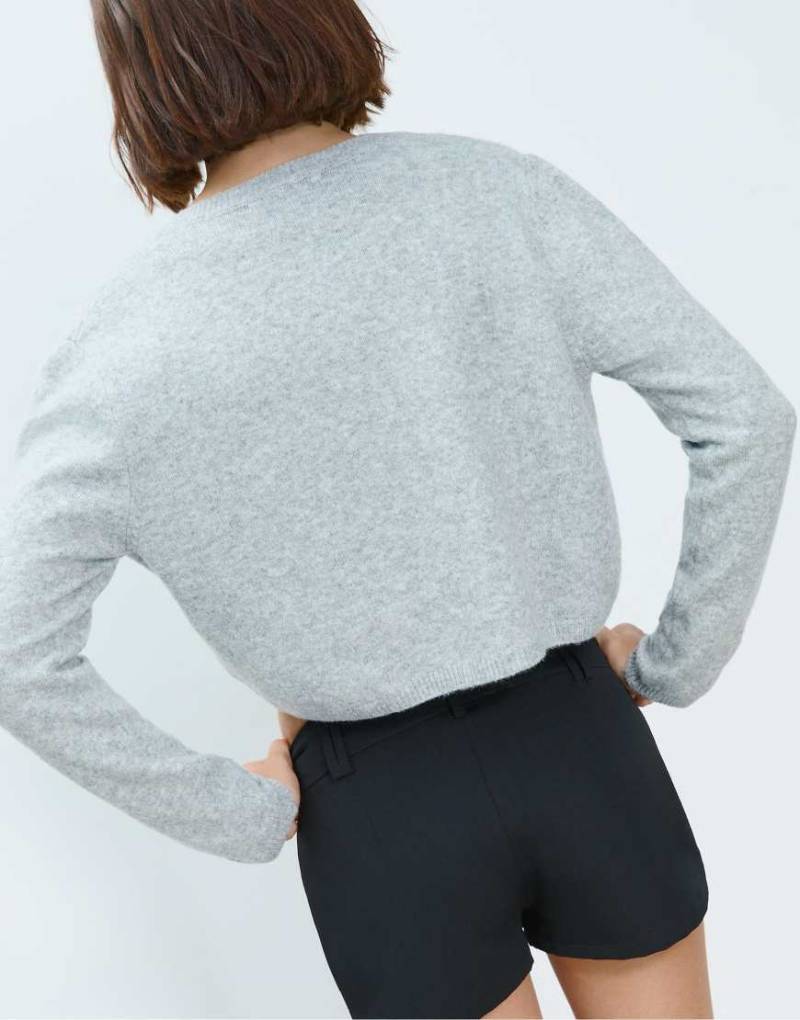 Stradivarius - Weiche Strickjacke in meliertem Grau mit Knopfleiste von Stradivarius