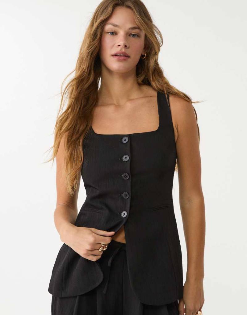 Stradivarius - Weste in Schwarz mit Strukturmuster von Stradivarius