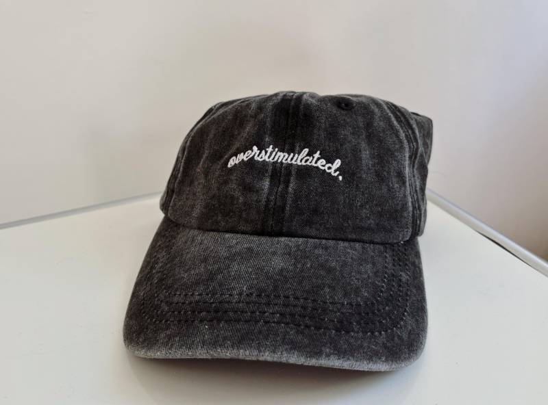 Stone Washed Cotton Cap With Embroidered Overstimulated Text - Vintage Look, Soft Fit, & Bold Statement For Everyday Wear von StudioAndStuff