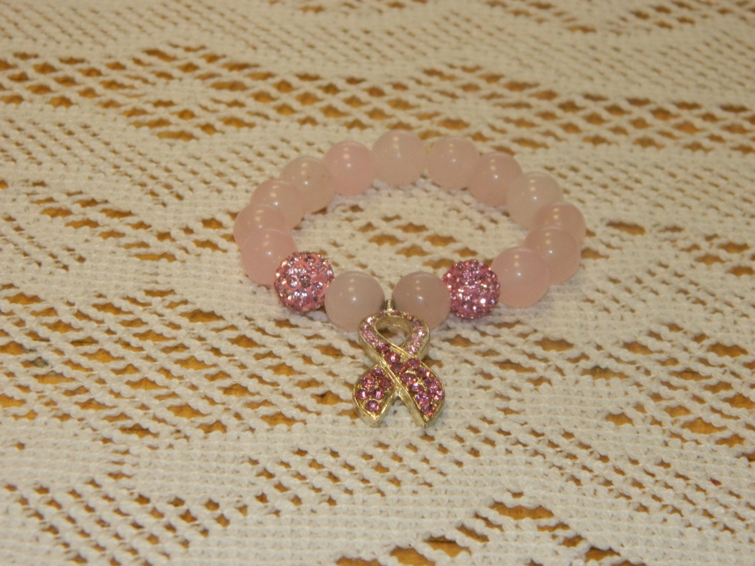 Krebs-Bewusstseins-Edelstein-Armbänder Krebs-Bewusstseins-Edelstein-Armbänder von Sunshinelines