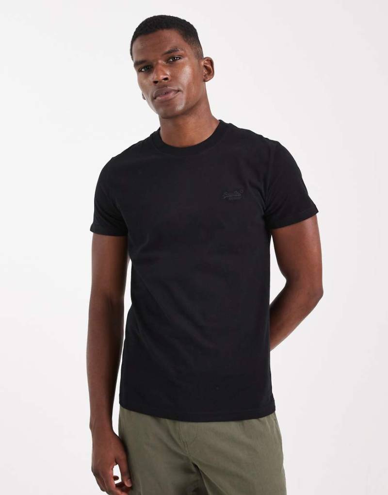Superdry - Cotton Essential - T-Shirt mit Logo in Schwarz/Schwarz Superdry - Cotton Essential - T-Shirt mit Logo in Schwarz/Schwarz von Superdry