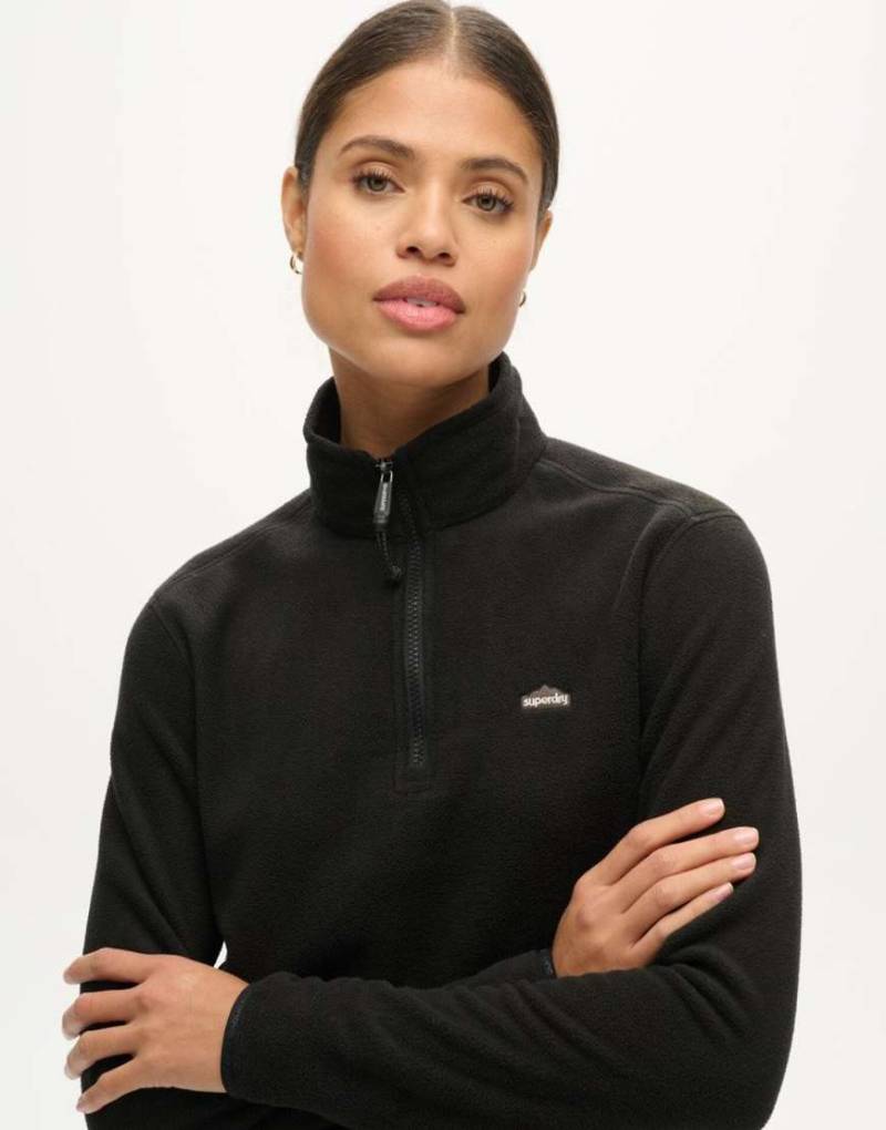 Superdry - Cropped Polarfleece-Pullover in Schwarz mit kurzem Reißverschluss von Superdry