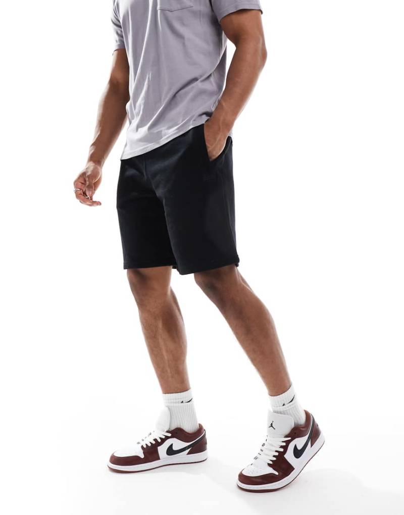 Superdry - Essential - Jersey-Shorts in Schwarz mit Logo von Superdry