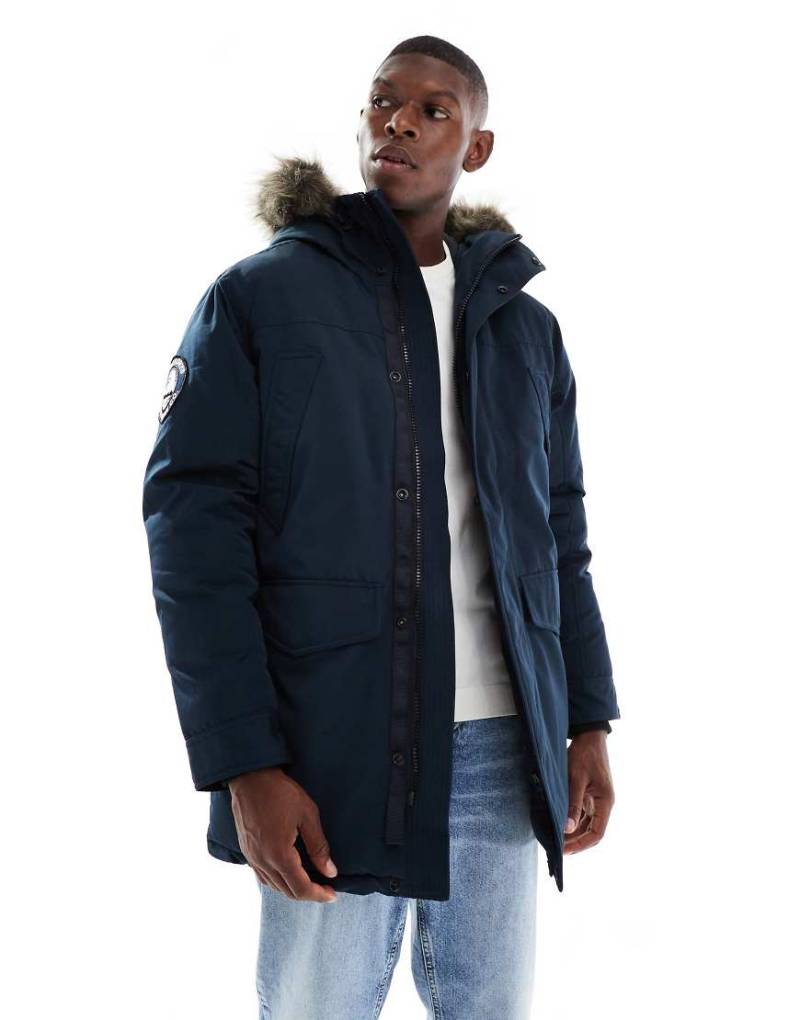 Superdry - Everest - Parka in Eclipse-Navy mit Kunstpelz-Marineblau Superdry - Everest - Parka in Eclipse-Navy mit Kunstpelz-Marineblau von Superdry