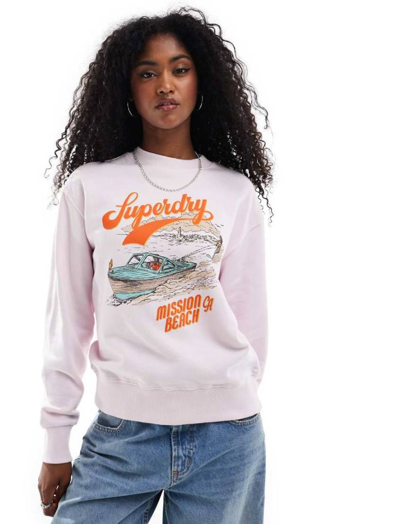 Superdry - Locker geschnittenes Sweatshirt in Wiegenrosa mit Souvenir-Grafik und Rundhalsausschnitt von Superdry