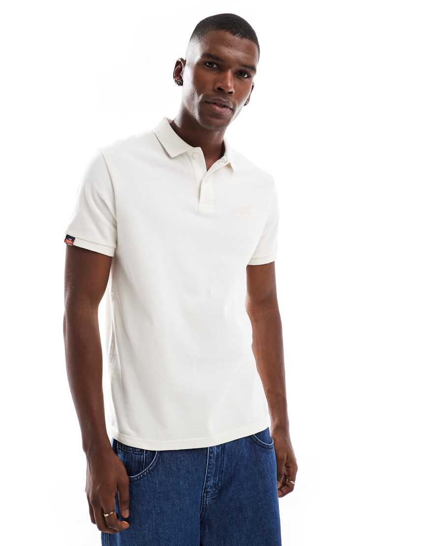 Superdry - Vintage-Polohemd in Kreideweiß im Used-Look von Superdry