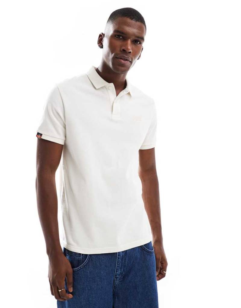 Superdry - Vintage-Polohemd in Kreideweiß im Used-Look von Superdry