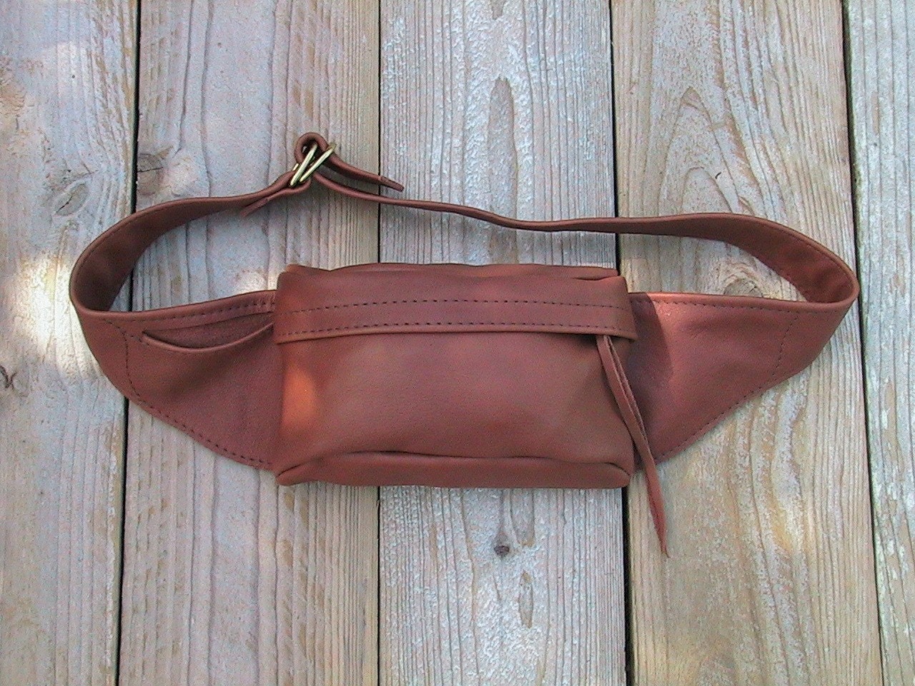Die Kleine Sattel-Hüfttasche Die Kleine Sattel-Hüfttasche von SwadeshiLeatherworks