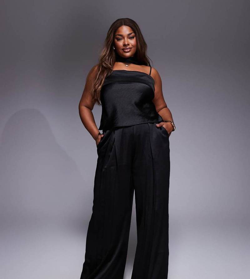 TFNC Plus - Elegante Hose in Schwarz mit weitem Bein, Kombiteil TFNC Plus - Elegante Hose in Schwarz mit weitem Bein, Kombiteil von TFNC Plus