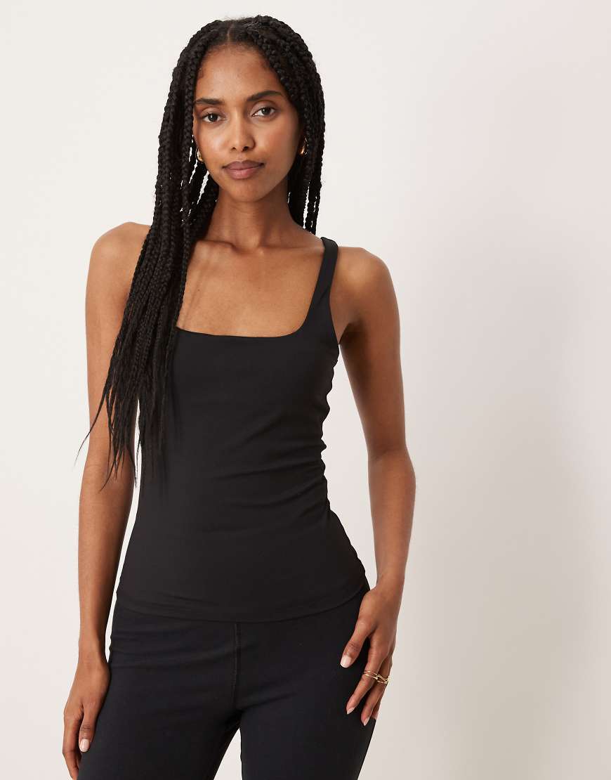 Tala - DayFlex - Basic-Trägertop in Schwarz mit integrierter Stützfunktion und eckigem Ausschnitt Tala - DayFlex - Basic-Trägertop in Schwarz mit integrierter Stützfunktion und eckigem Ausschnitt von Tala