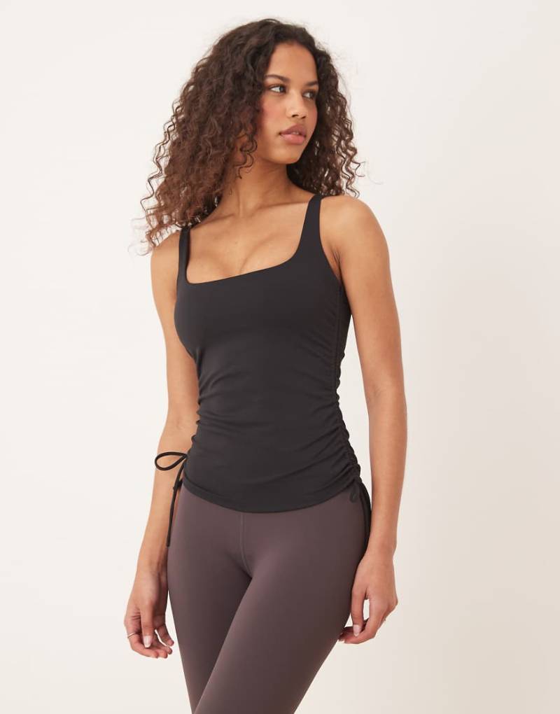 Tala - DayFlex - Trägertop in Schwarz mit integrierter, verstellbarer Stützfunktion und seitlichem Bindedetail von Tala