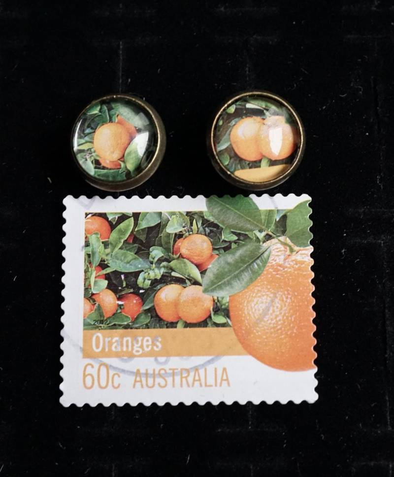Upcycling Ohrstecker Aus Briefmarke Orange 10mm Upcycling Ohrstecker Aus Briefmarke Orange 10mm von TanzaufRuinen