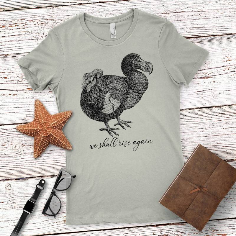 Frauen Dodo Wir Steigen Wieder Grafik T-Shirt, Lustige Tier Tshirt, Ausgestorbene Shirt von TeeNook