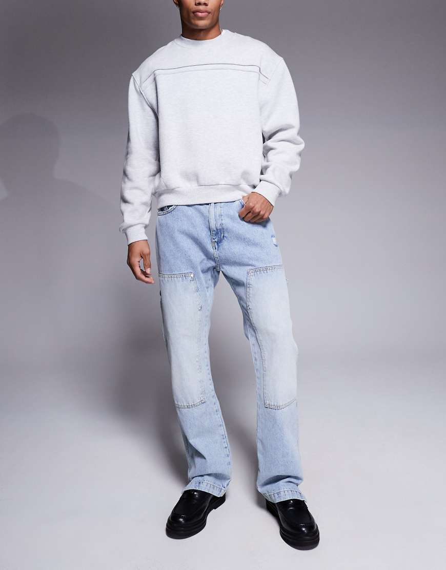 The Couture Club - Carpenter-Jeans in blauer Waschung mit Nietendesign The Couture Club - Carpenter-Jeans in blauer Waschung mit Nietendesign von The Couture Club