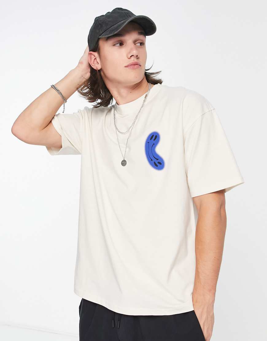 The Couture Club - Locker geschnittenes T-Shirt in gebrochenem Weiß mit verzerrten Placement-Prints von The Couture Club