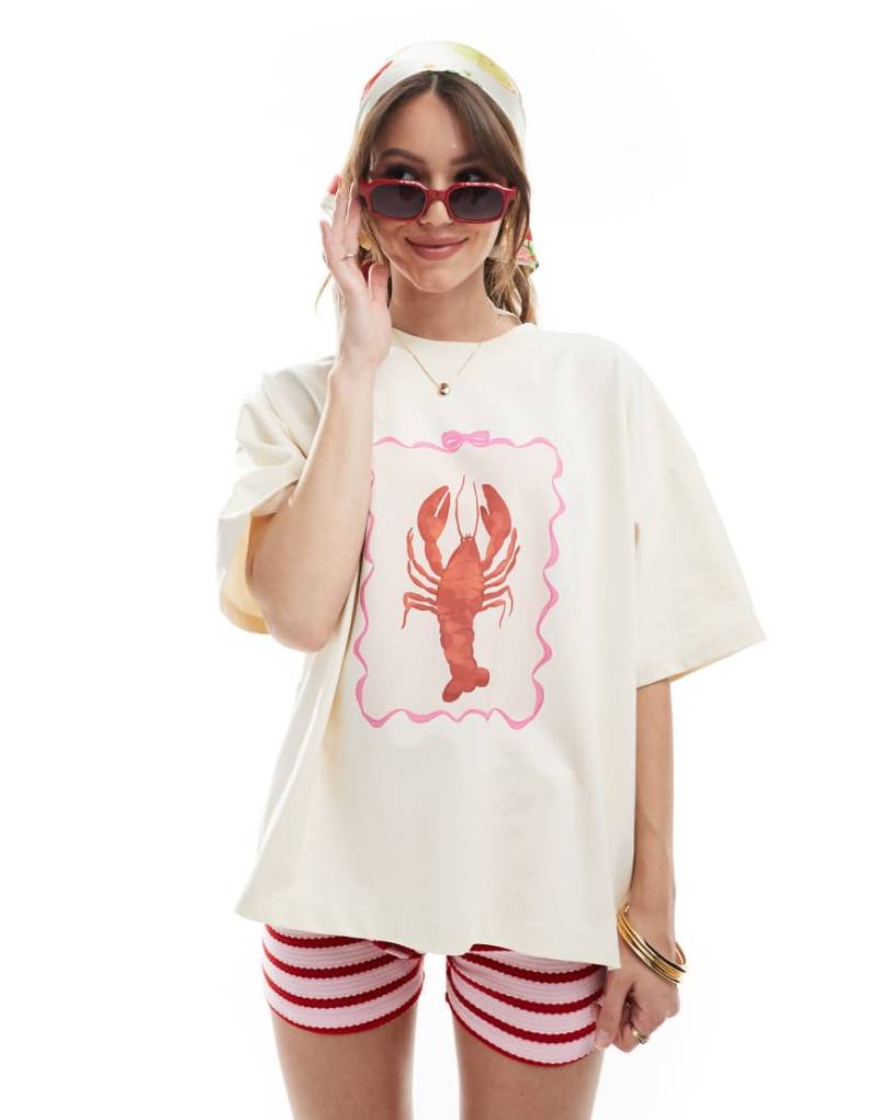 The Frolic - Exklusives Oversize-T-Shirt in Cremeweiß mit Hummer-Print von The Frolic