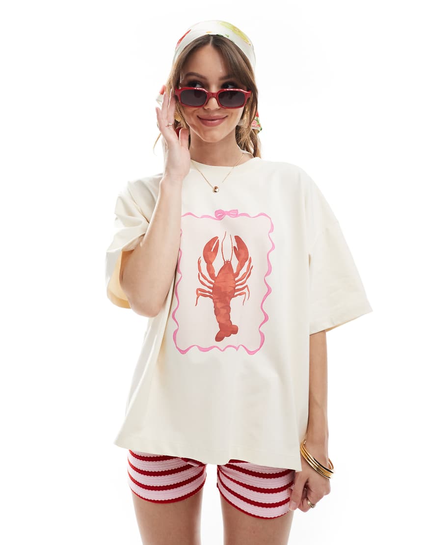 The Frolic - Exklusives Oversize-T-Shirt in Cremeweiß mit Hummer-Print von The Frolic