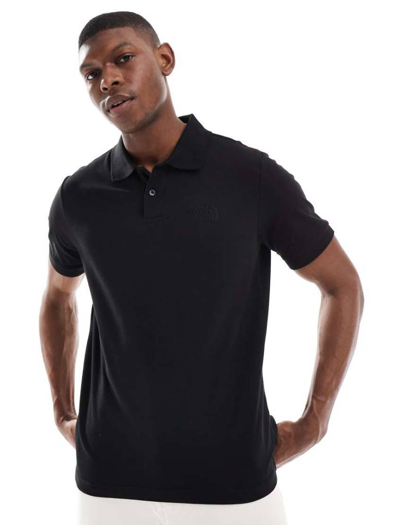 The North Face - Essential - Poloshirt in TNF-Schwarz mit regulärem Schnitt von The North Face