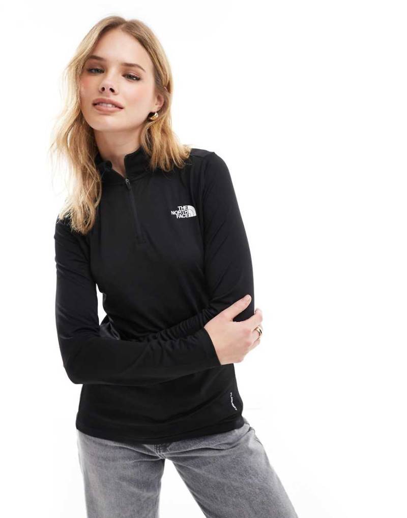 The North Face - Flex - Oberteil in Schwarz mit kurzem Reißverschluss The North Face - Flex - Oberteil in Schwarz mit kurzem Reißverschluss von The North Face