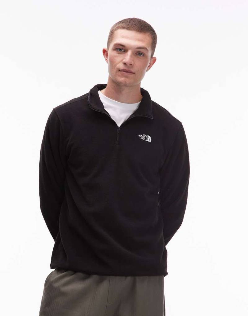 The North Face - Glacier 100 - Fleece-Oberteil in Schwarz mit kurzem 1/4-Reißverschluss The North Face - Glacier 100 - Fleece-Oberteil in Schwarz mit kurzem 1/4-Reißverschluss von The North Face