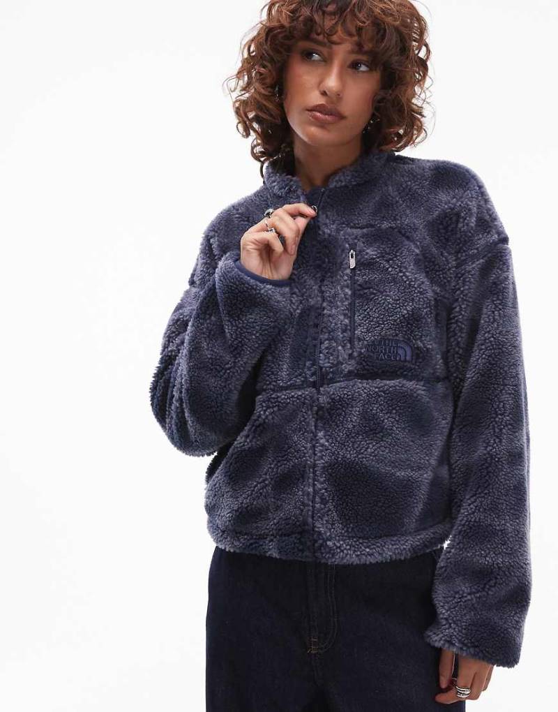 The North Face - Hochflorige Teddyfleece-Jacke in Marineblau mit Reißverschluss und Halo-Muster The North Face - Hochflorige Teddyfleece-Jacke in Marineblau mit Reißverschluss und Halo-Muster von The North Face