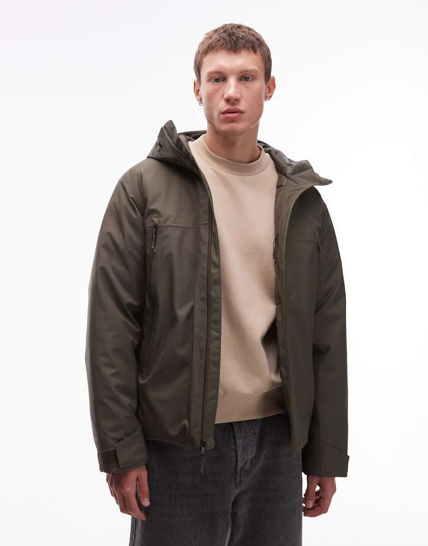 The North Face - MTN Range - Wasserdichter, isolierter Daunenjacke in Dunkelgrün mit Kapuze von The North Face