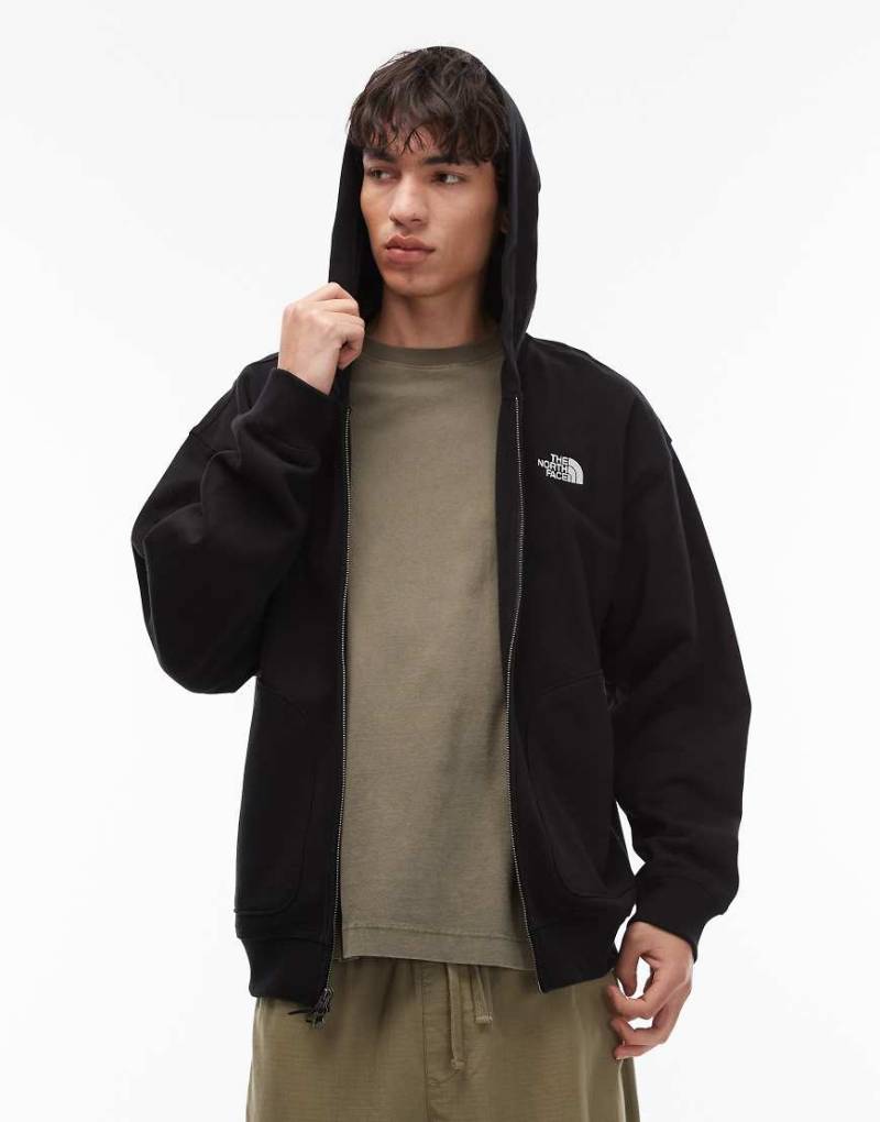 The North Face - Oversize-Kapuzenpullover in Schwarz mit doppeltem Reißverschluss und Logo von The North Face