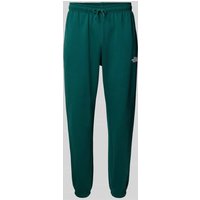The North Face Regular Tapered Fit Sweatpants mit Label-Print in Gruen, Größe L von The North Face