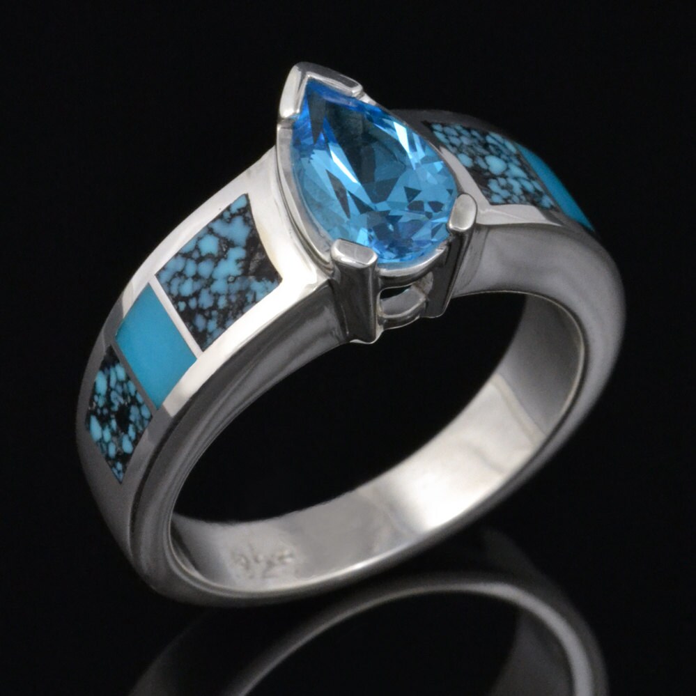 Türkiser Verlobungsring Oder Ehering Mit Spinnennetz Türkis Und Blautopas Türkiser Verlobungsring Oder Ehering Mit Spinnennetz Türkis Und Blautopas von TheHilemanCollection