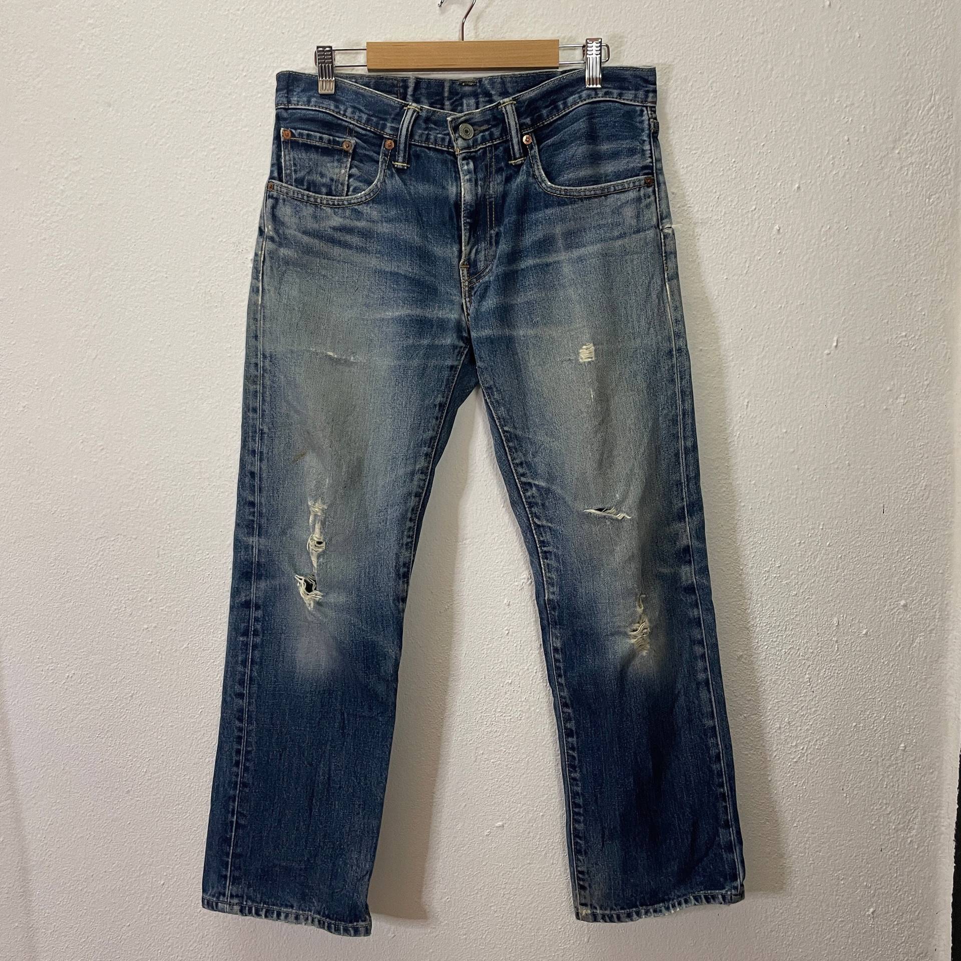 Vintage Levis 502 Jeans Distressed Kurt Cobain Style Denim W32 von TheShahStore