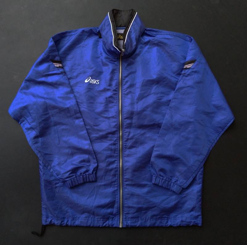 Vintage 90Er Jahre Asics Mens L Buchstabieren Durchgehender Reißverschluss Kapuze Windbreaker Jacke Blau von TheVintageGarment