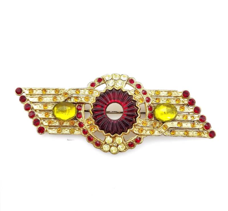 Seltene Art Deco Brosche Aus Rotem Glas Und Goldton Mit Roten, Grünen Orangen Strasssteinen Seltene Art Deco Brosche Aus Rotem Glas Und Goldton Mit Roten, Grünen Orangen Strasssteinen von ThingsGrandmaKept