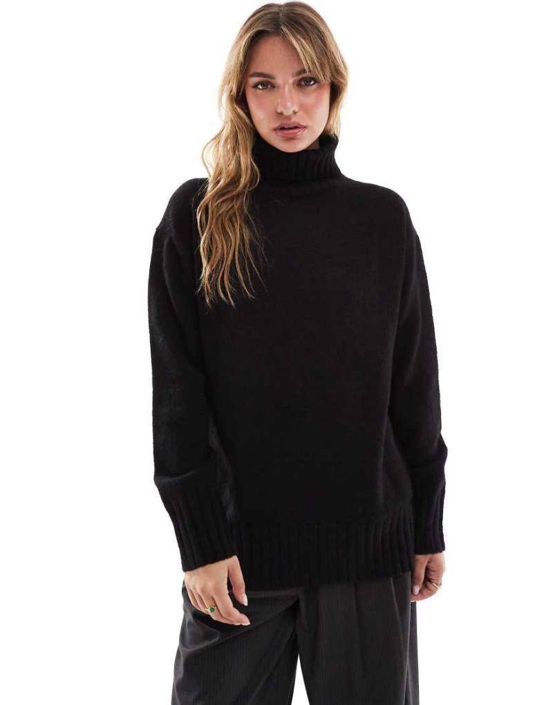 Threadbare - Flauschiger Oversize-Pullover in Schwarz mit Rollkragen Threadbare - Flauschiger Oversize-Pullover in Schwarz mit Rollkragen von Threadbare