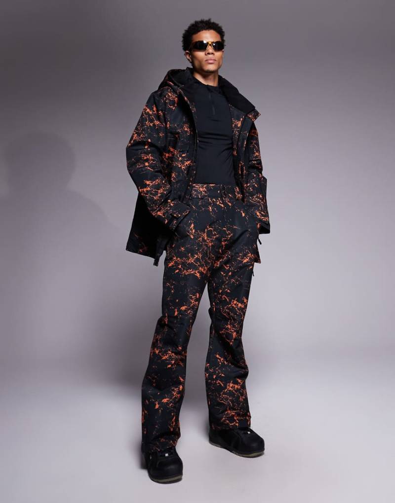 Threadbare - Gemusterte Skihose in Schwarz und Orange von Threadbare