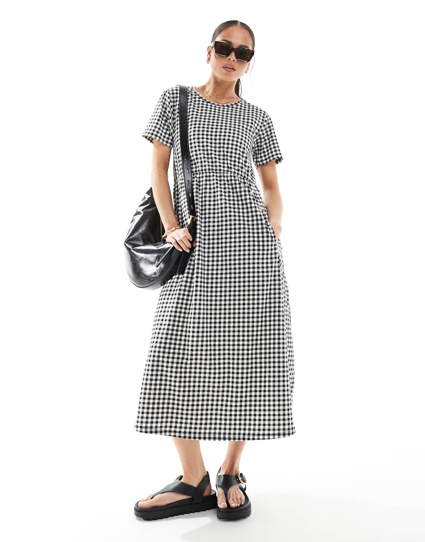 Threadbare - Kurzärmeliges Midikleid aus Jersey mit schwarz-weißem Vichy-Karomuster und Taschen-Bunt Threadbare - Kurzärmeliges Midikleid aus Jersey mit schwarz-weißem Vichy-Karomuster und Taschen-Bunt von Threadbare