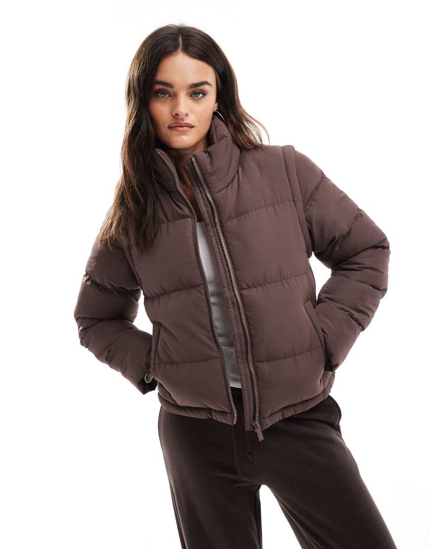 Threadbare - Kurze Pufferjacke in Braun mit Reißverschluss und abnehmbaren Ärmeln Threadbare - Kurze Pufferjacke in Braun mit Reißverschluss und abnehmbaren Ärmeln von Threadbare