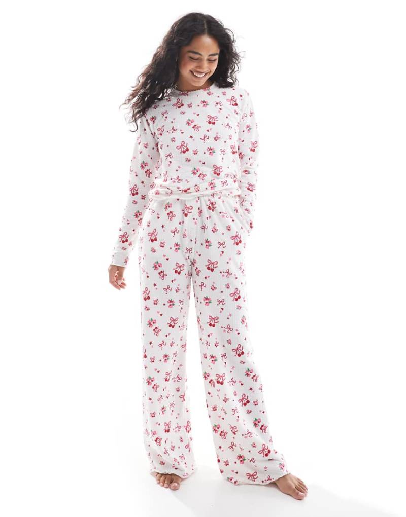 Threadbare - Langärmliger Pyjama in Rosa und Weiß mit Schleifenmuster von Threadbare