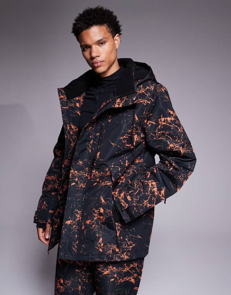 Threadbare - Skijacke in Schwarz und Orange gemustert mit Reißverschluss und Kapuze von Threadbare